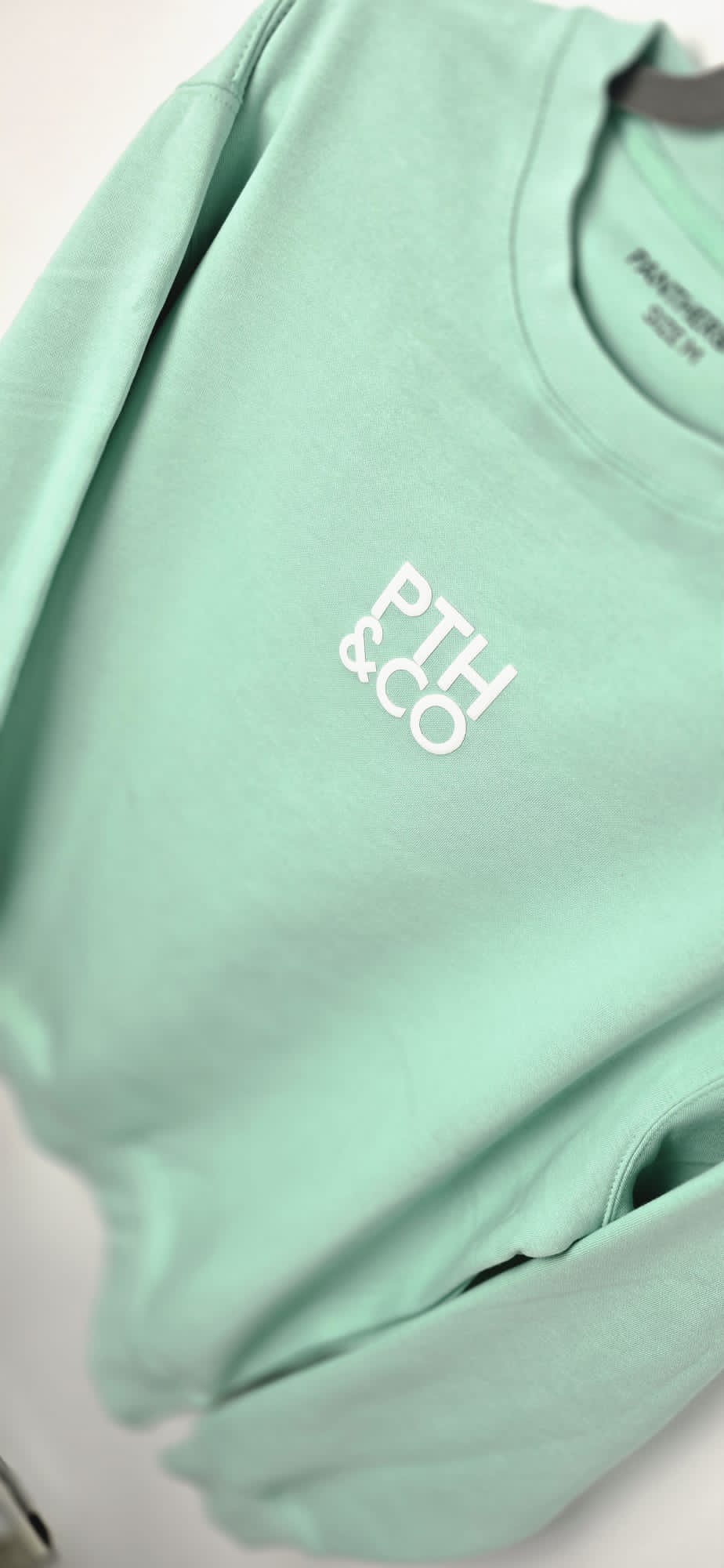 SUDADERA UNISEX CUELLO REDONDO VERDE AGUA