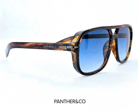 Guía de gafas de sol Cómo elegir las gafas de sol que mejor van con tu rostro - gafas de sol Panther&Co con cristales azules.