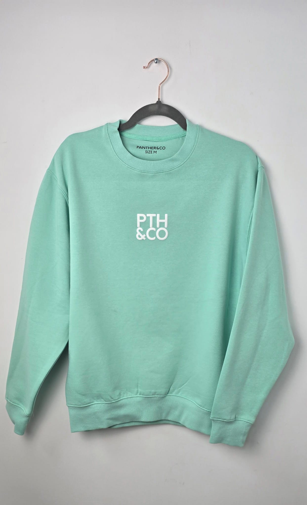 SUDADERA UNISEX CUELLO REDONDO VERDE AGUA